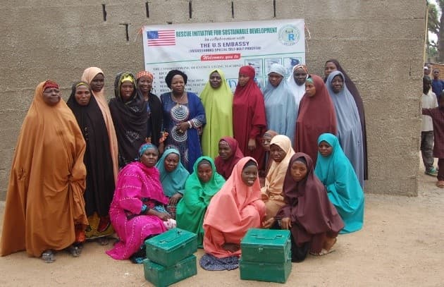 Women group photo with RISD and US Embassy partnership banner